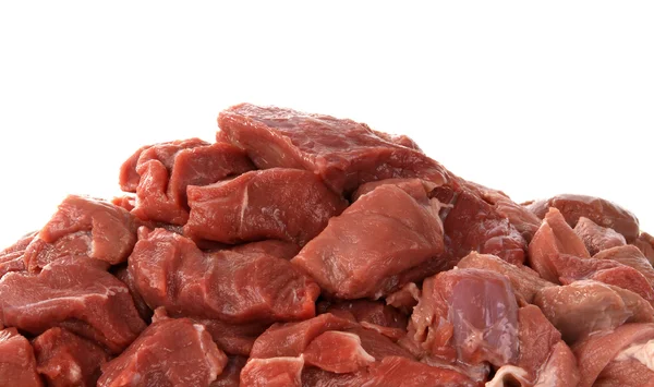 Trozos de carne cruda sobre un fondo blanco —  Fotos de Stock