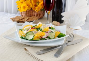 Vitamin salad with pink wine clipart