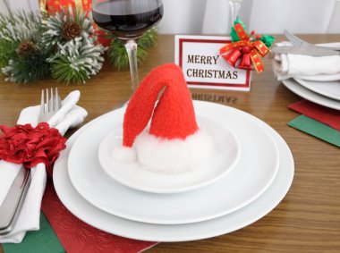 Christmas hat on a plate clipart