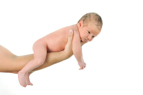 Padre mano tenuta bella un mese bambino — Foto Stock