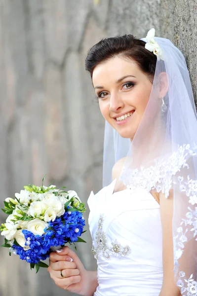 Bride with flowers — Stock Photo, Image