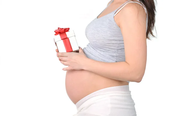 Mujer embarazada con regalo —  Fotos de Stock