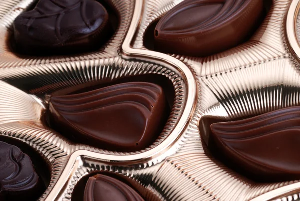 Chocolade in folie vak — Stockfoto
