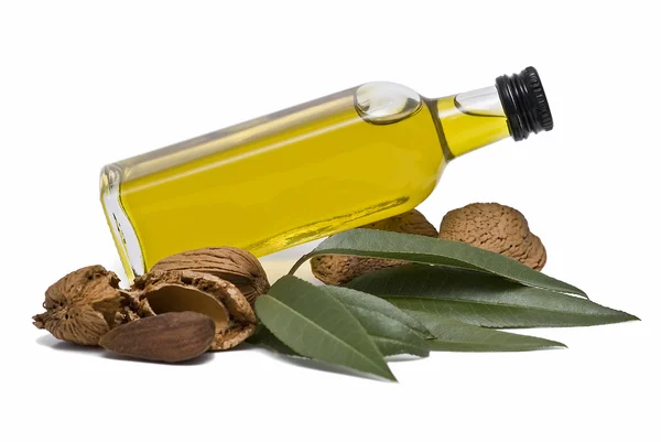 stock image Almond oil and almonds.