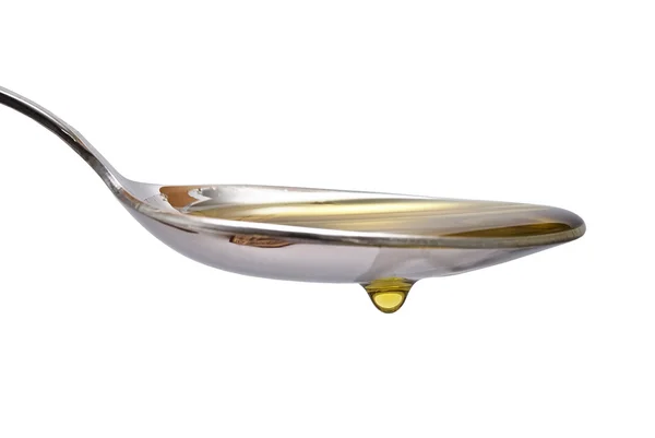 Łyżka z oliwą z oliwek. — Zdjęcie stockowe
