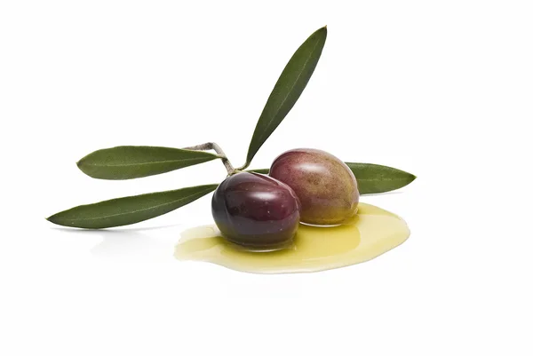 Two olives in oil. — Stock Photo, Image