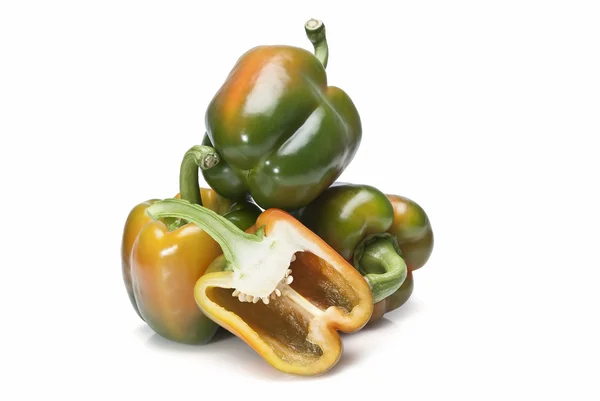 Three peppers and a half. — Stock Photo, Image