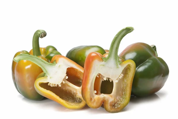 Peppers and one cut. — Stock Photo, Image