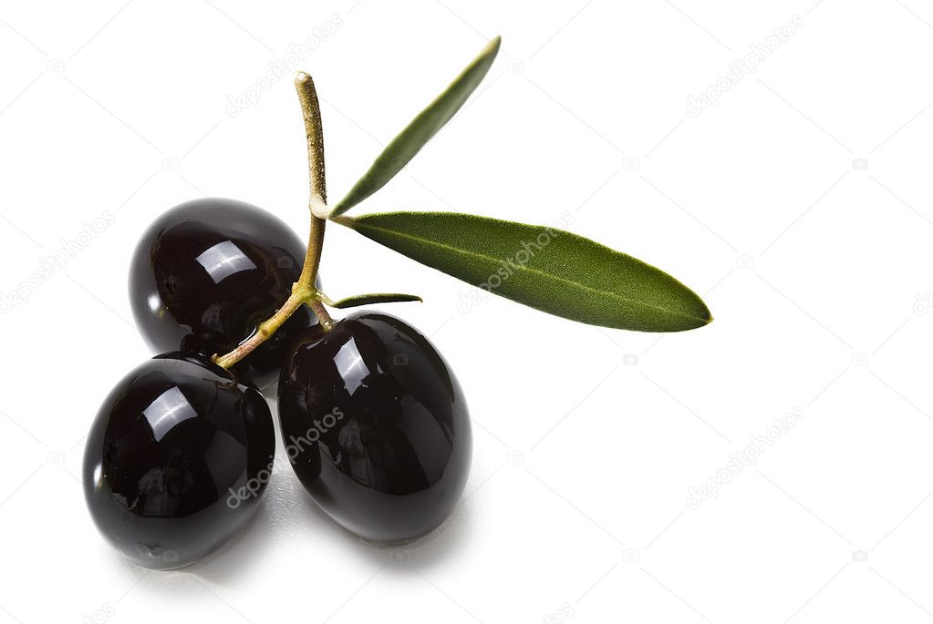 Three black olives with leaves. — Stock Photo © angelsimon 7299714