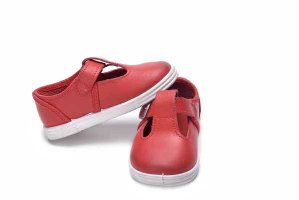 Klasyczne czerwone buty dla dzieci. — Zdjęcie stockowe