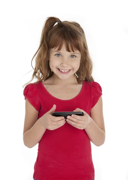 Roztomilá holčička drží mobil — Stock fotografie