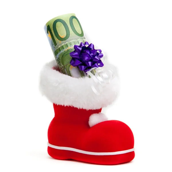 Euro in boot of Santa Claus on white background — Stock Photo, Image