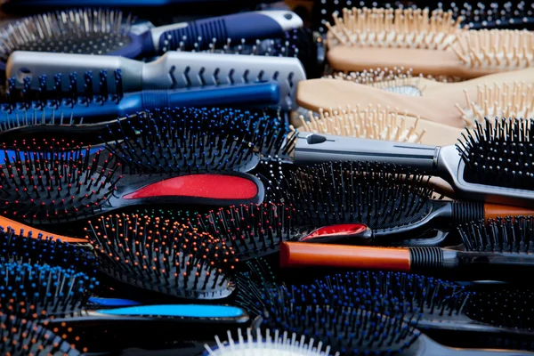 Combs. Different types of hairbrushes — Stock Photo, Image