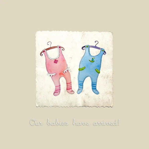 Baby arrival card with cute baby coveralls — Stock Photo, Image