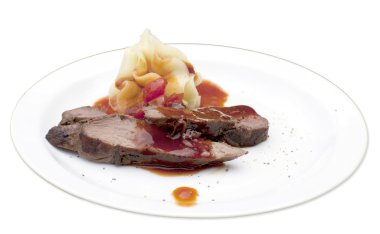 Deer sirloin, served with mashed potatoes with roasted garlic an clipart