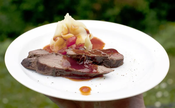 stock image Deer sirloin, served with mashed potatoes with roasted garlic an