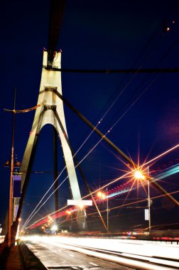 City car bridge at night clipart