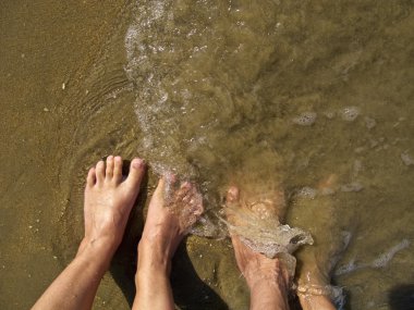 Füsse im Meer