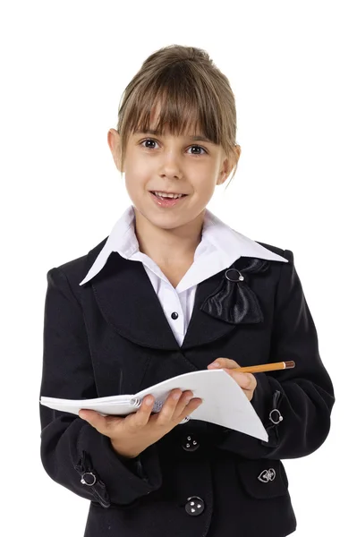Little school girl in uniform — Stock Photo, Image