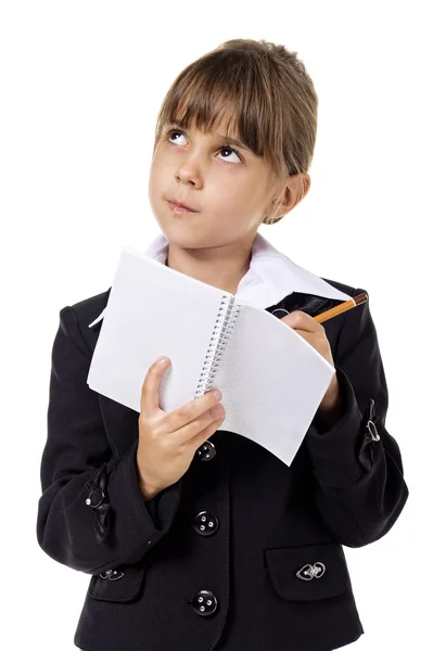 Little school girl in uniform — Stock Photo, Image