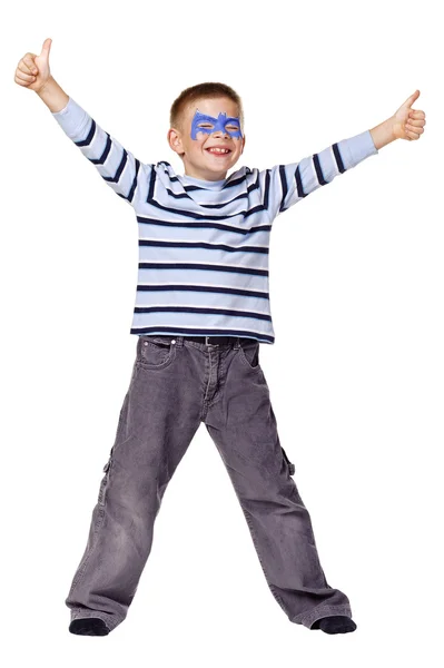 Счастливый мальчик показывает большие пальцы вверх — стоковое фото