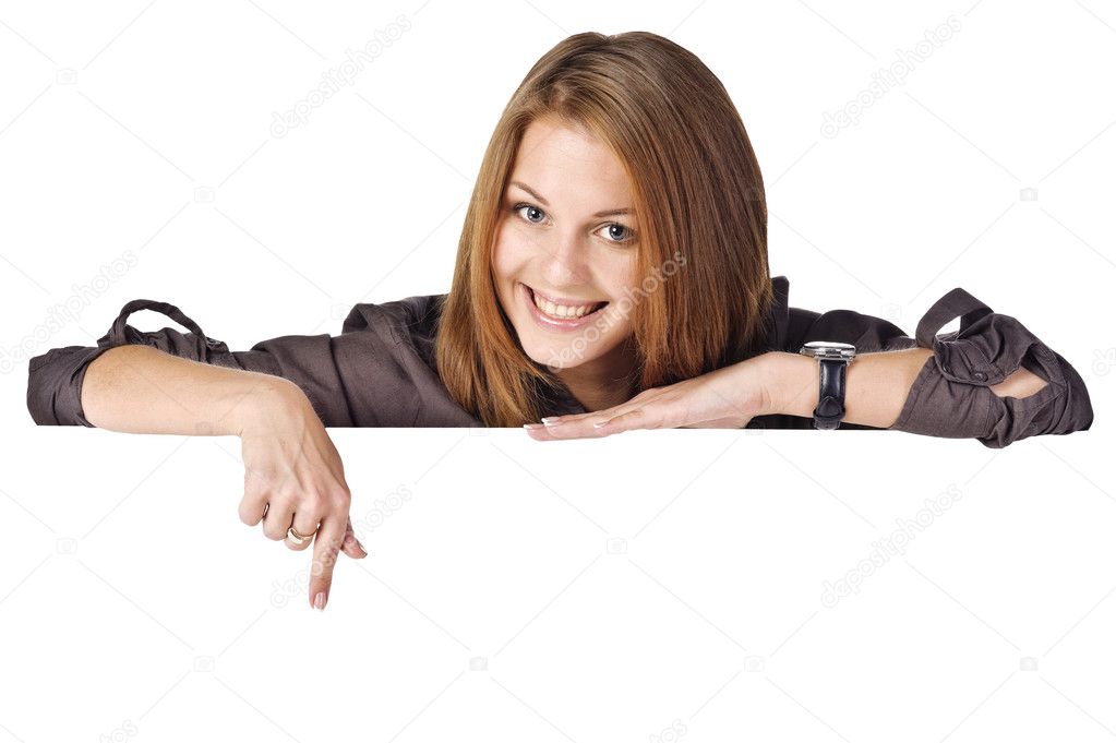 Young woman with blank billboard