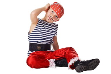 Dreamy kid wearing in pirate costume clipart