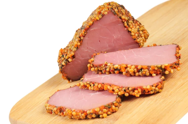 Piece of a ham with spices — Stock Photo, Image