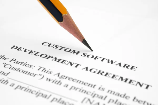 Acordo de desenvolvimento de software — Fotografia de Stock