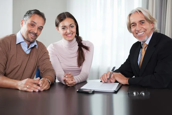 Financial advisor in meeting with a young couple — Stock Photo, Image