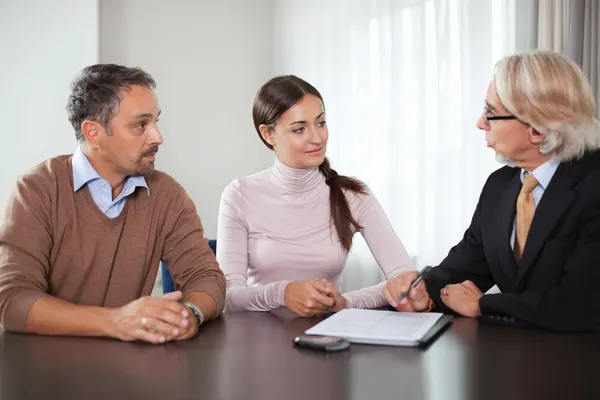 Couple in meeting with a financial planner — Stock Photo, Image
