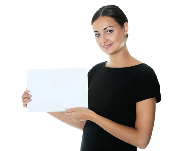 Pretty young lady holding a blank billboard — Stock Photo, Image