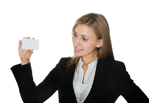 Mujer de negocios bastante joven con una tarjeta en blanco —  Fotos de Stock