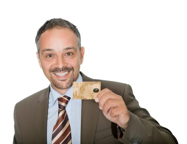 Empresário feliz segurando um crad de crédito — Fotografia de Stock