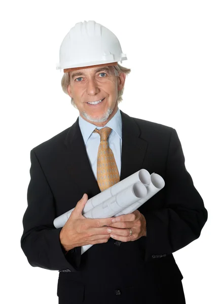 Bir kask giymiş ve elinde planları mimar — Stok fotoğraf