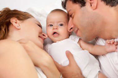 Parents with their cute little girl clipart