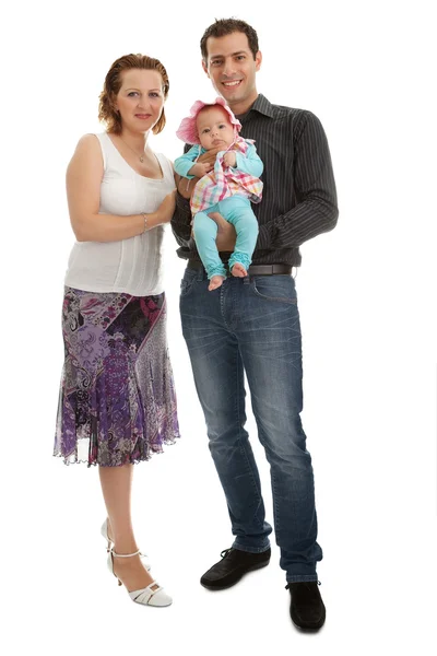 Portrait of a happy young family standing — Stock Photo, Image