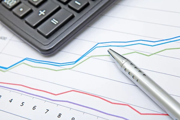 Financial charts on the table — Stock Photo, Image