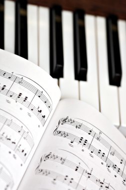 Piano and lyrics book clipart