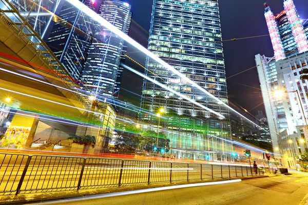 Light trails in modern city — Stock Photo, Image