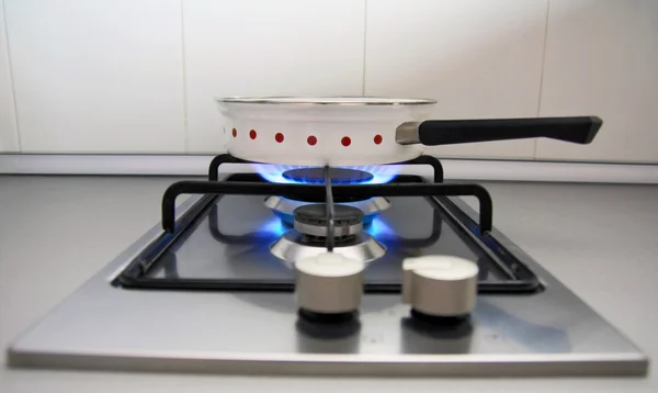 Frying pan on burner — Stock Photo, Image