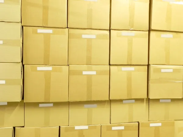Verpakking van vakken in een magazijn. — Stockfoto