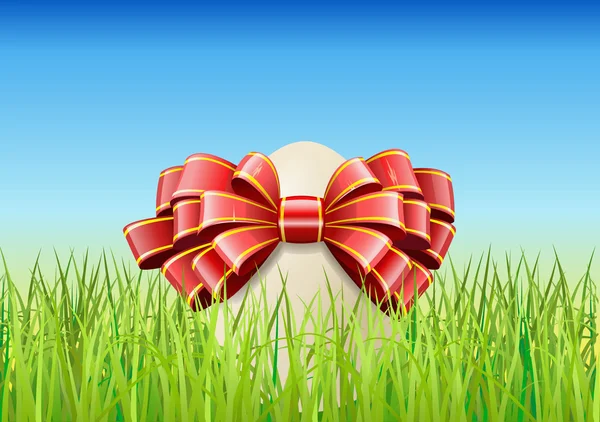 Easter egg is on the grass. — Stock Vector