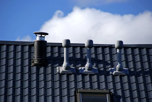 Pipes, tile and sky — Stock Photo, Image