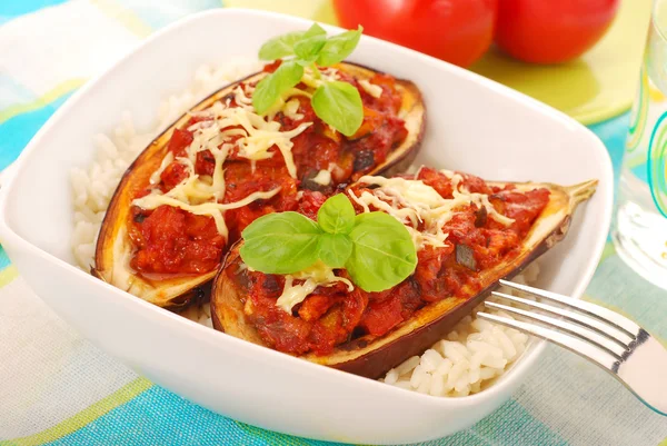 Aubergine with vegetable filling on rice — Stock Photo, Image