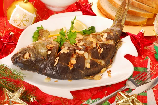 Carp baked with almonds for christmas — Stock Photo, Image