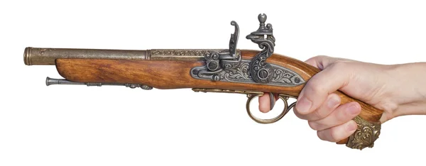 Mano con pistola vieja — Foto de Stock