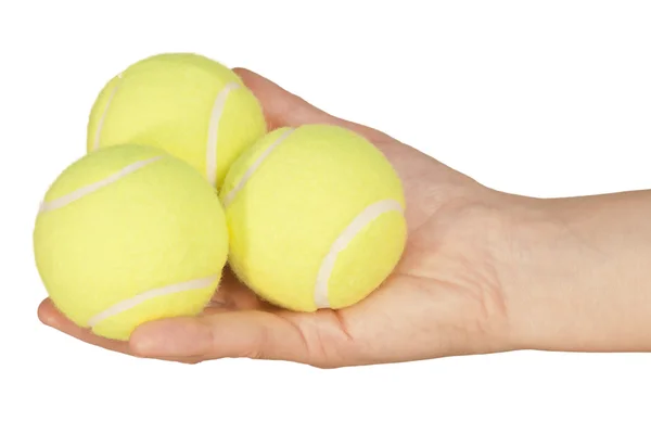 Тенісний м'яч у руці — стокове фото