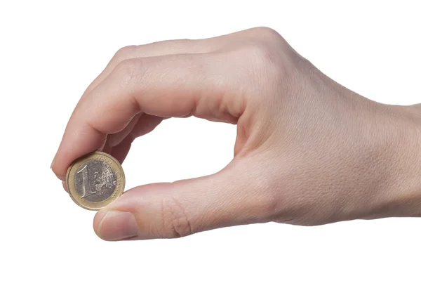 Hand holds the coin 1 euros — Stock Photo, Image