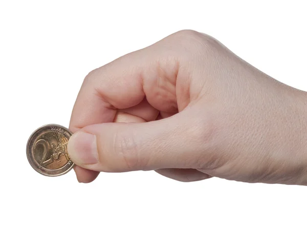 La mano sostiene la moneda 2 euros — Foto de Stock